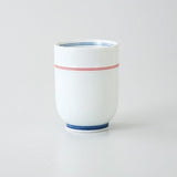 Saikai Ceramics: Red Trim, White Porcelain Yunomi Tea Cup with Blue Accents 150 ml - Yunomi.life